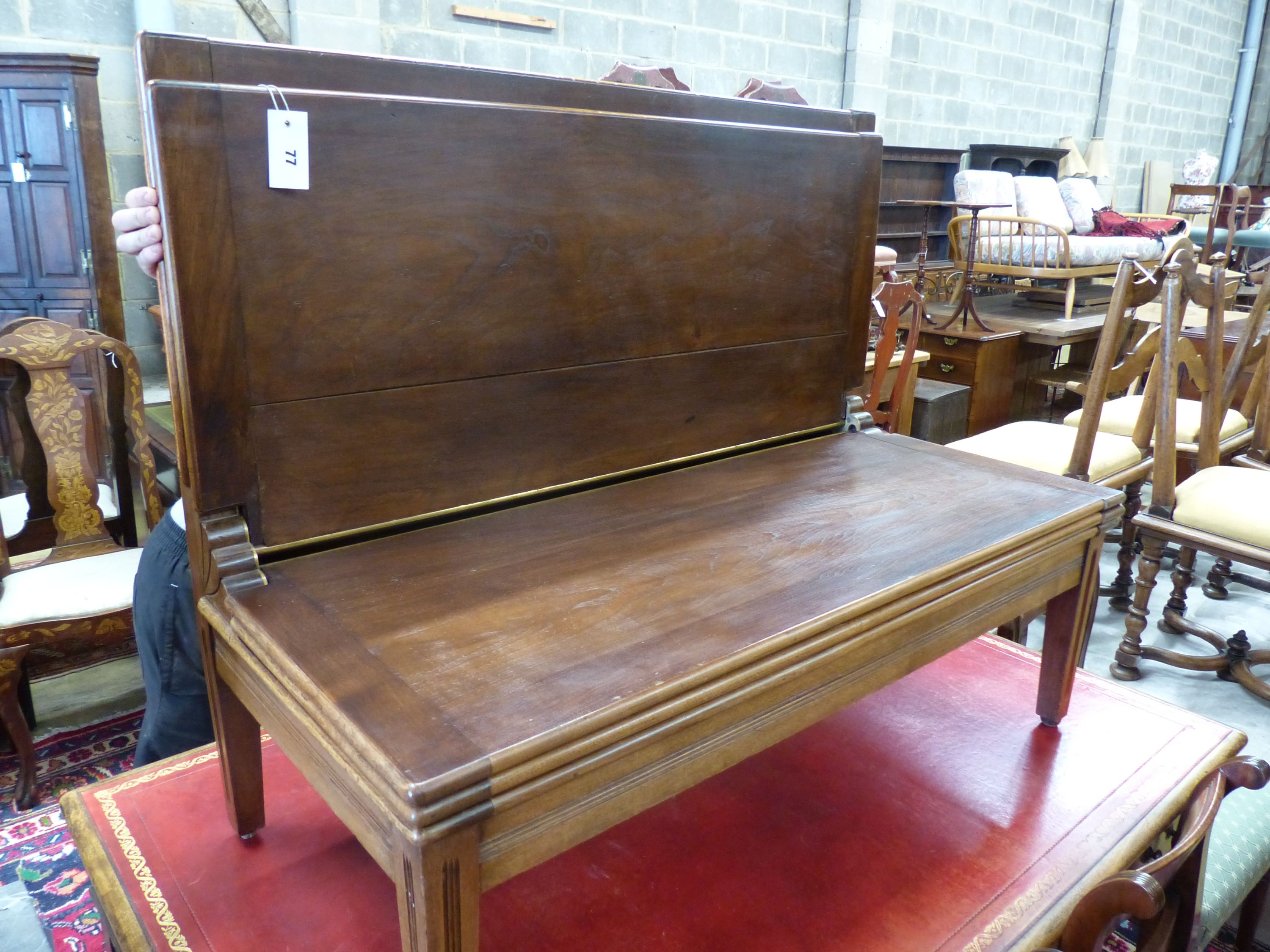 A mahogany trouser press-cum-bench seat, circa 1900, height 45cm, width 106cm, depth 54cm